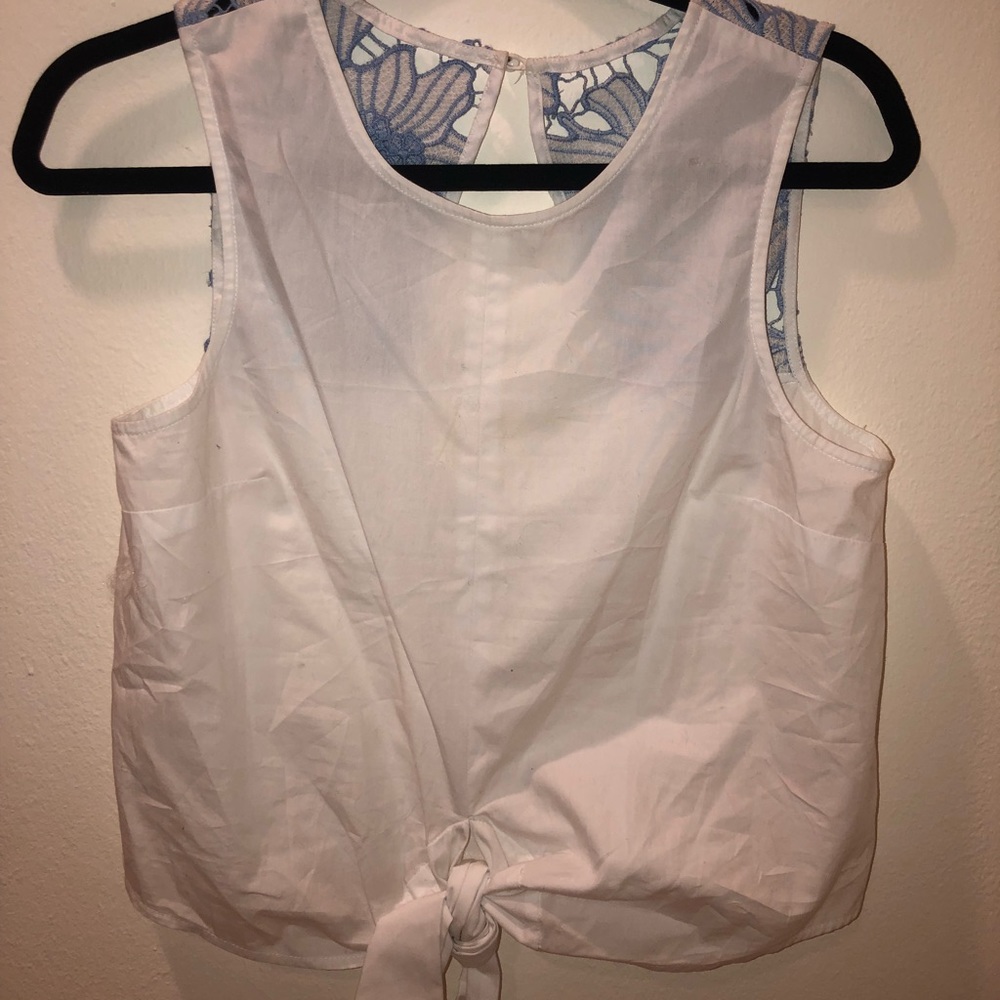White tie-front top, blue floral design on back